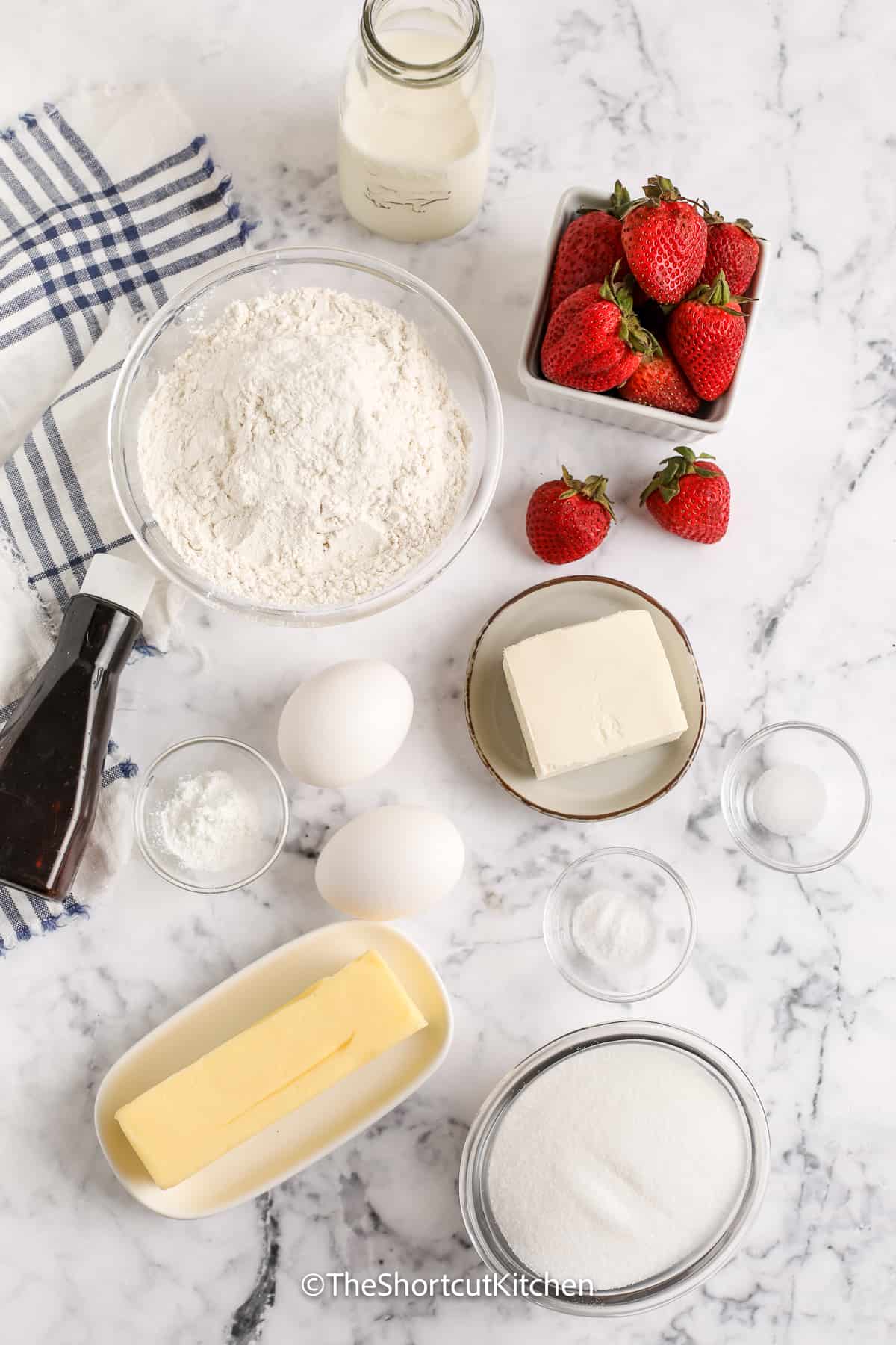 ingredients assembled to make strawberry cream cheese cake