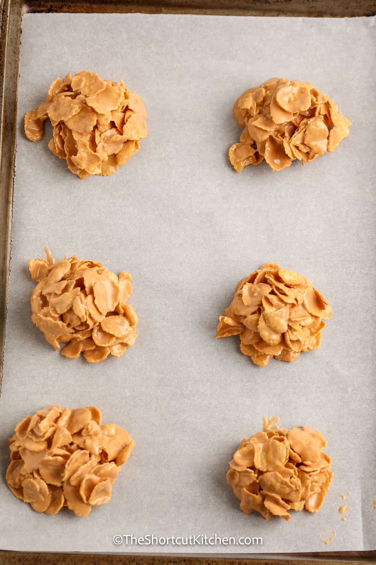 butterscotch crunchies balls arranged on a pan