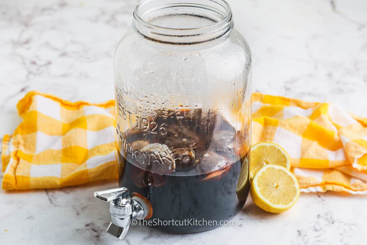 adding Easy Sweet Tea ingredients to pitcher