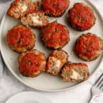 mozzarella stuffed mini meatloaf on a plate