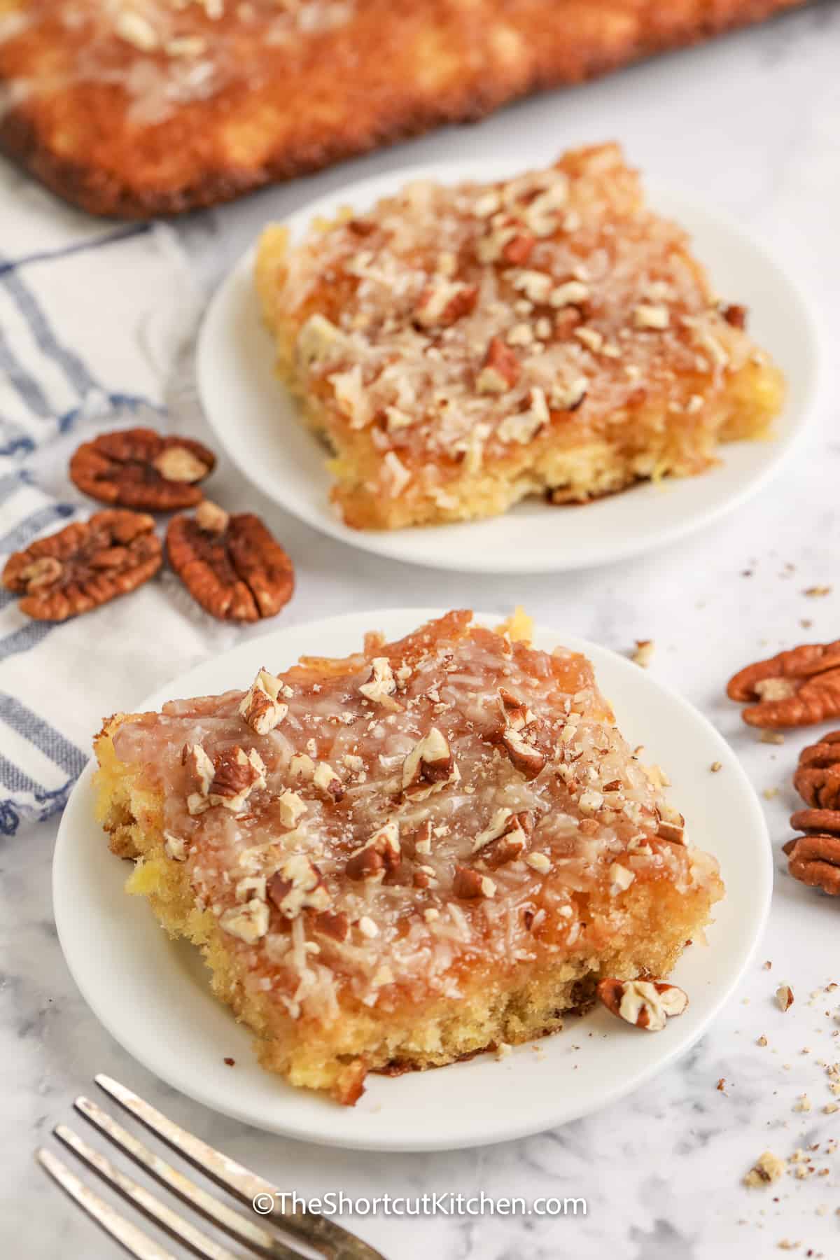 pineapple sheet cake slice on a plate