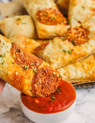 dipping Pizza Dippers in marinara sauce