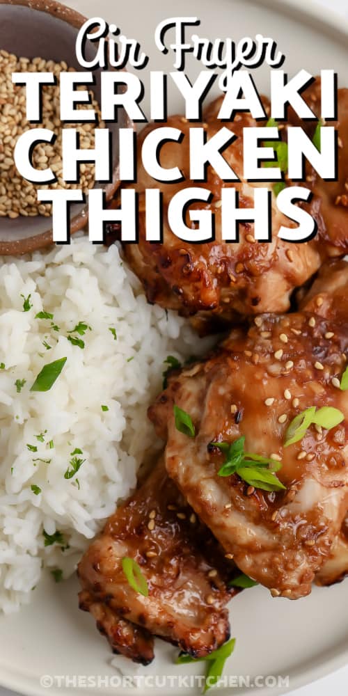 teriyaki chicken thighs on a plate with rice with text