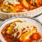 plate of Three Cheese Lasagna Rolls with pan full in the back