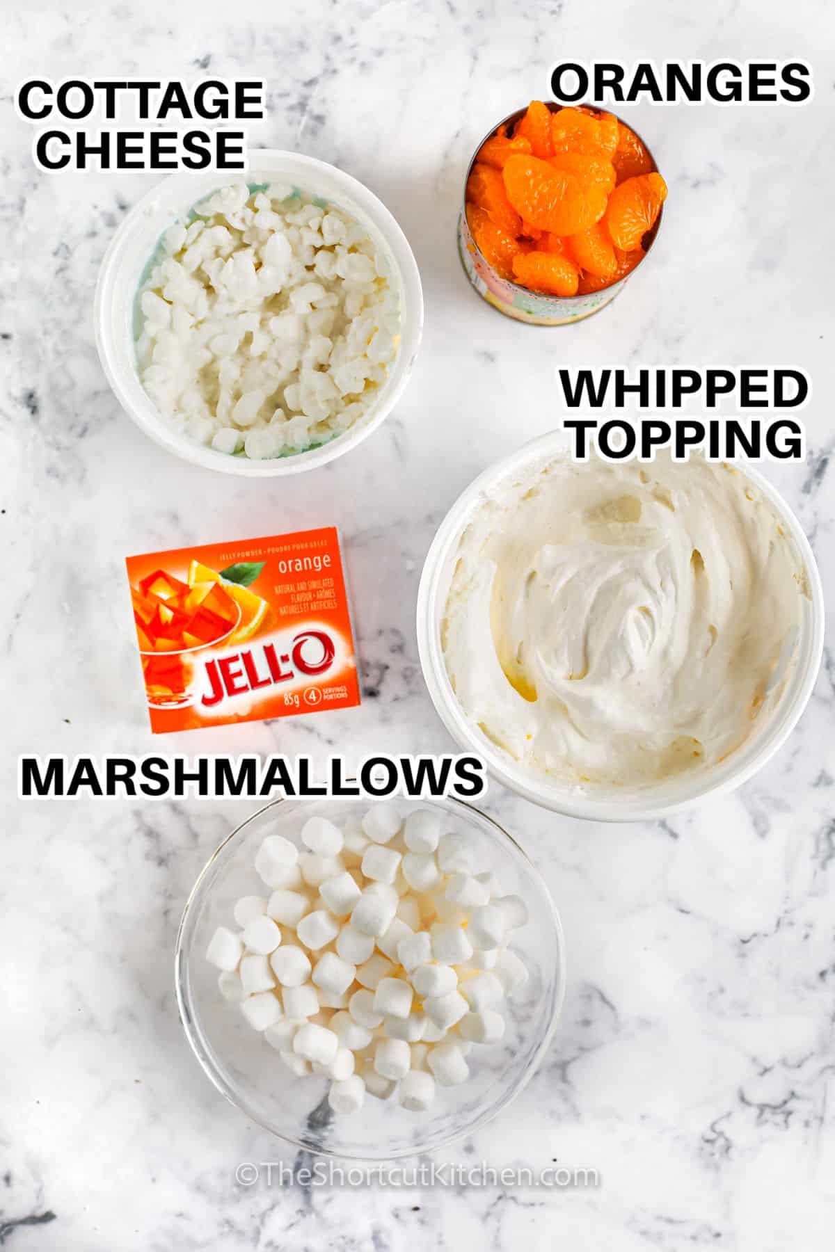 whipped topping , oranges , cottage cheese , jello and marshmallows to make Cottage Cheese Orange Jello Salad with labels