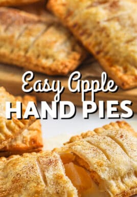cooked Apple Hand Pies with one in half and writing