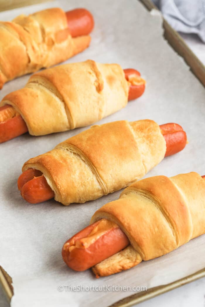Crescent Roll Hot Dogs on a sheet pan baked