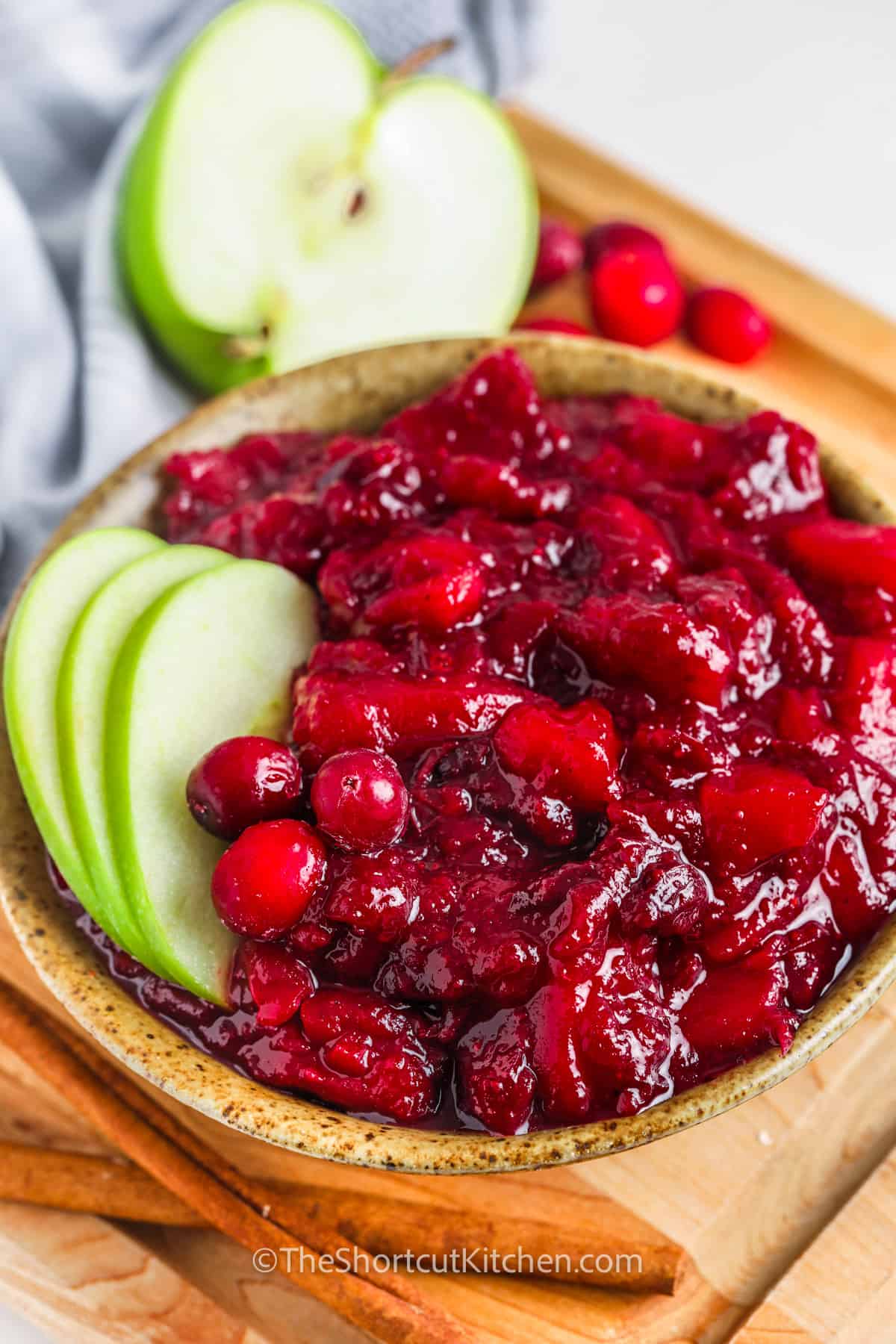 plated Fresh Cranberry Apple Sauce with apple slices