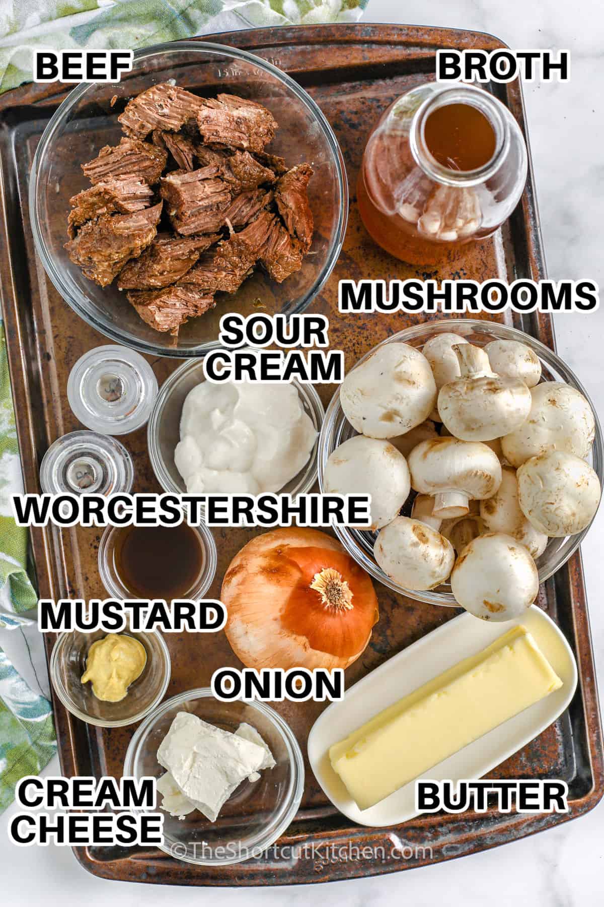 mushrooms , beef , sour cream , broth , butter , cream cheese , onion and Worcestershire to make Beef Stroganoff Recipe with labels