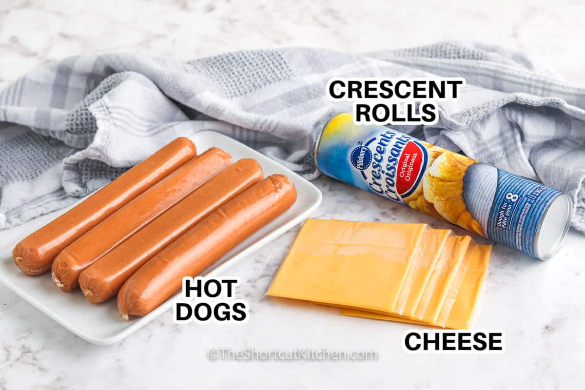 hot dogs , cheese and crescent rolls to make Crescent Roll Hot Dogs