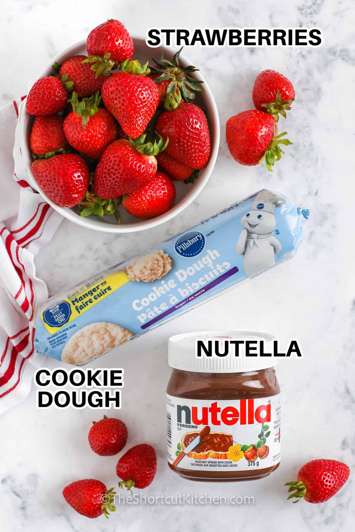 nutella , cookie dough and strawberries with labels to make Nutella Pizza Recipe