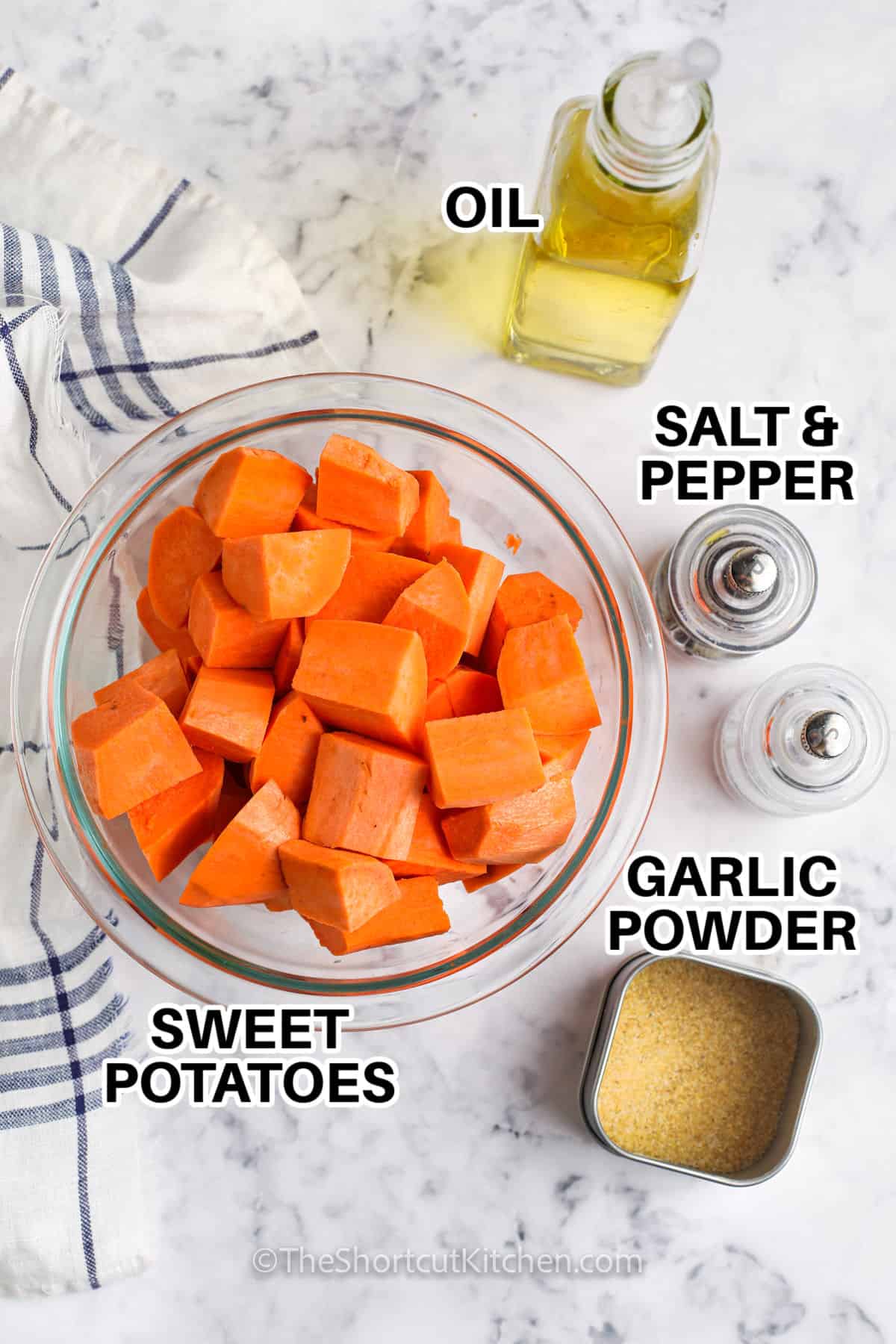 sweet potatoes , oil , salt and pepper and garlic powder with labels to make Oven Roasted Sweet Potatoes