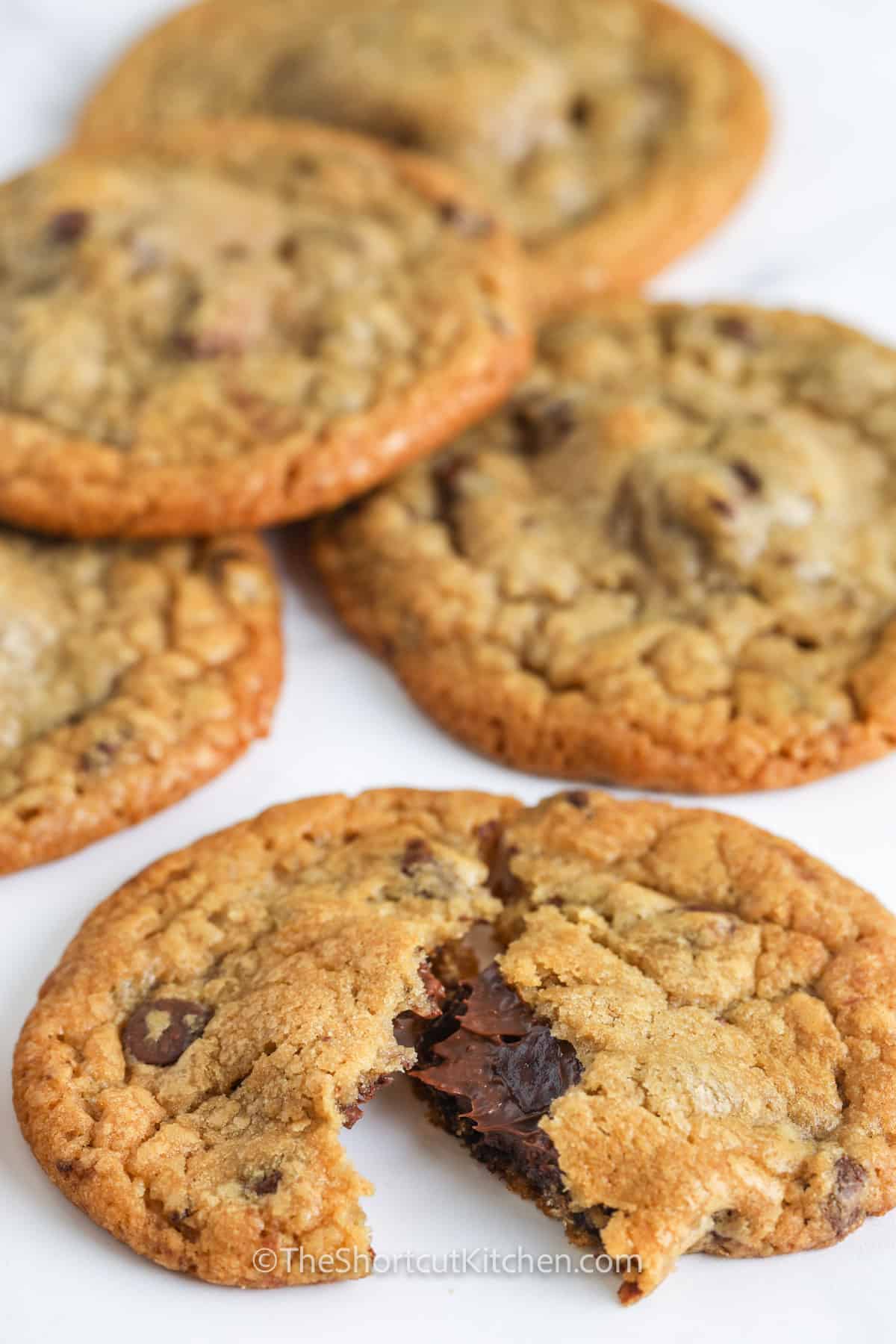 cooked Nutella Stuffed Cookies with one open