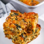 stack of Cheesy Spinach Stuffing Casserole slices