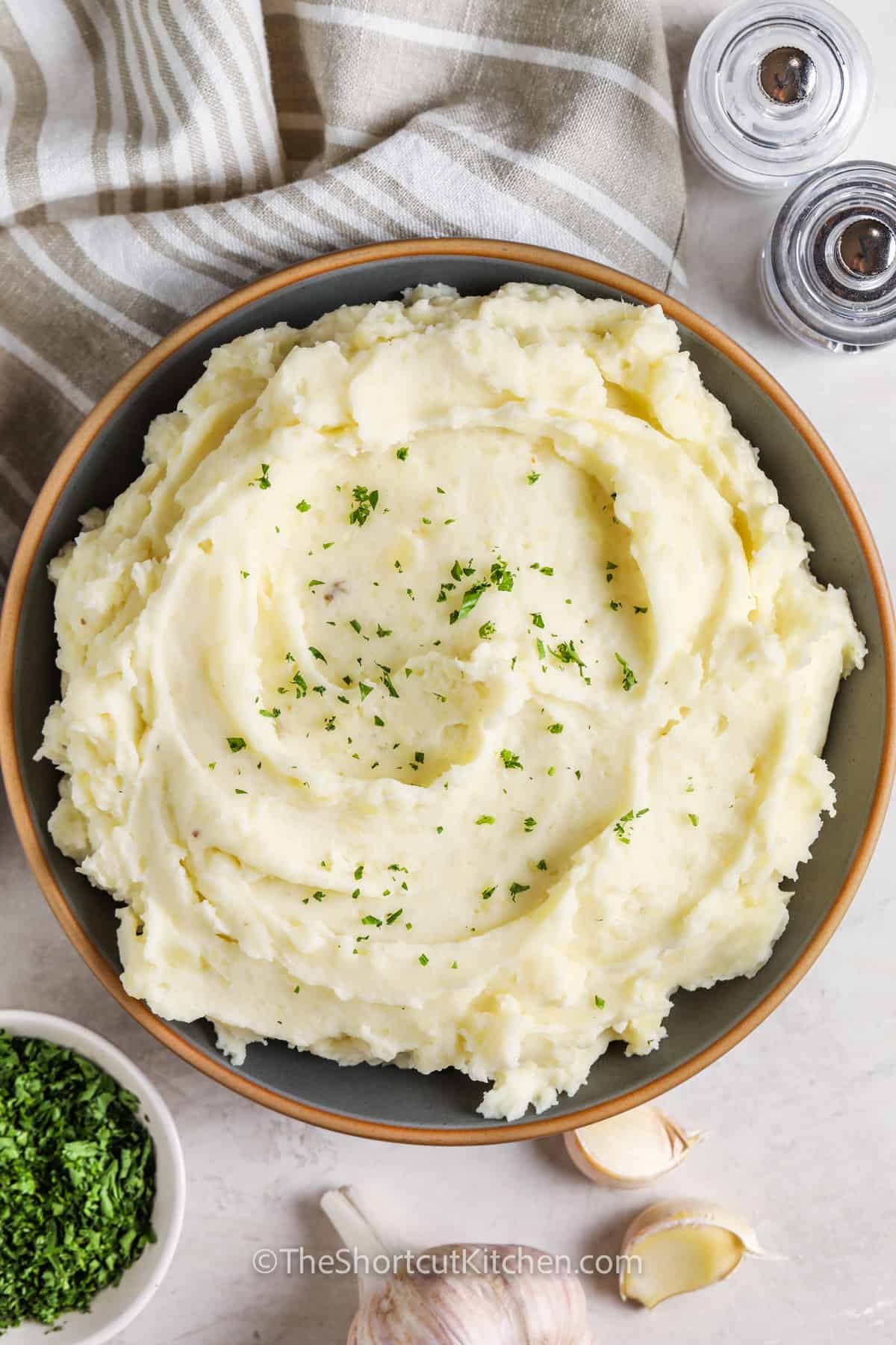 top view of Creamy Garlic Mashed Potatoes on a plate