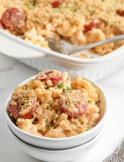 creamy sausage mac and cheese topped with parsley