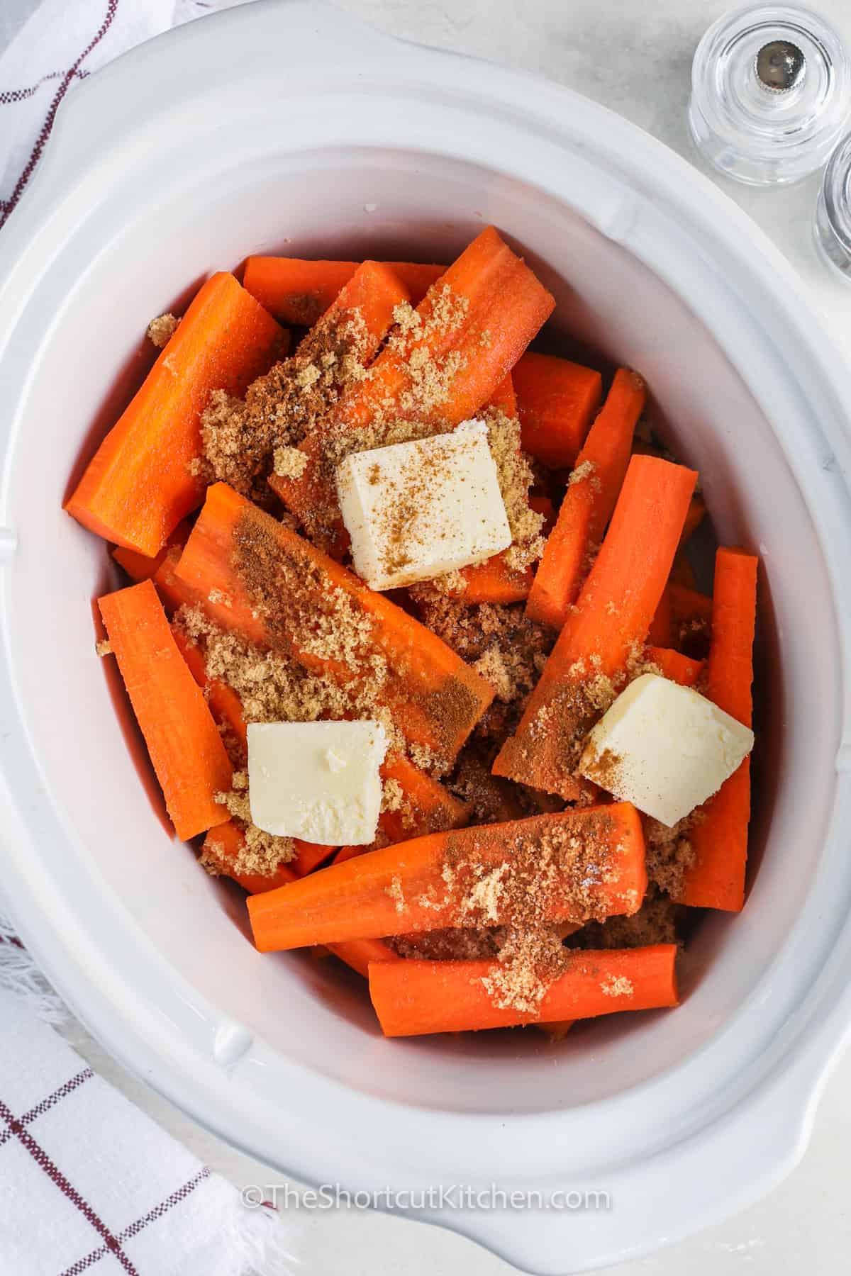 ingredients in the crock pot to make Crockpot Carrots