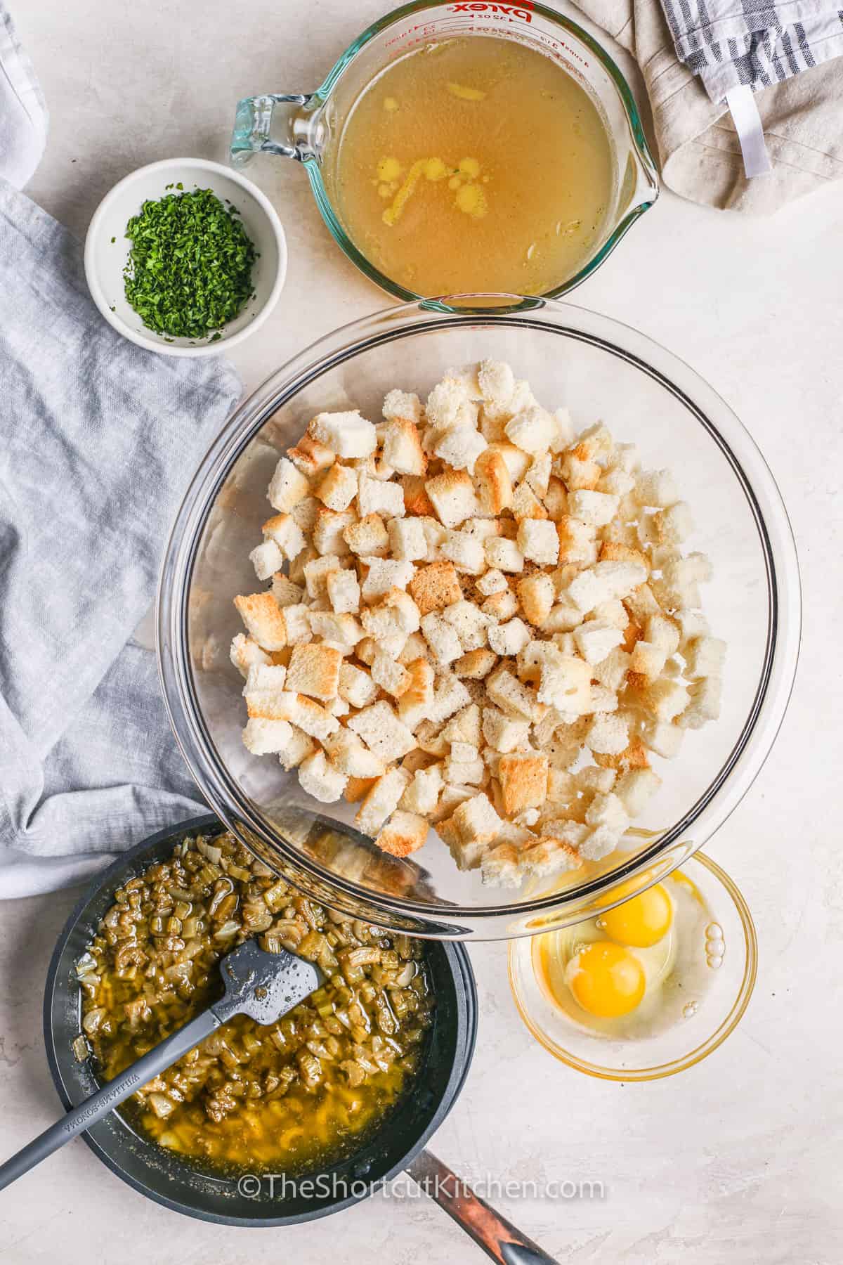 ingredients in bowls before adding together to make Easy Slow Cooker Stuffing