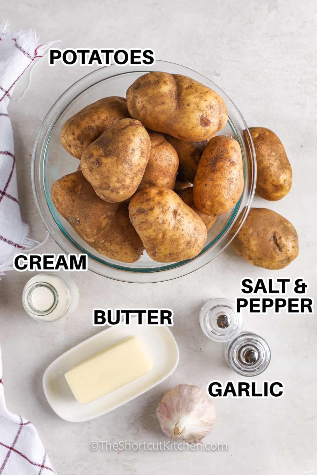 potatoes , butter , cream , garlic and salt and pepper with labels to make Creamy Garlic Mashed Potatoes