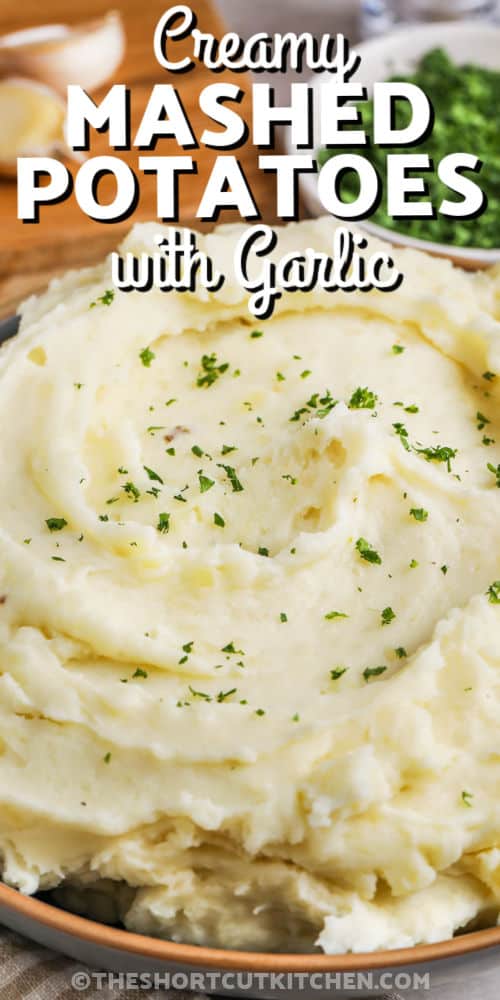 close up of Creamy Garlic Mashed Potatoes with writing