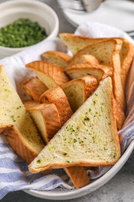 bowl full of Texas Toast Garlic Bread slices
