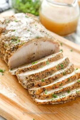 cooked Crock Pot Pork Loin sliced into pieces with gravy