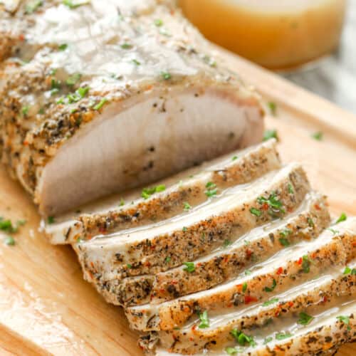 cooked Crock Pot Pork Loin sliced into pieces with gravy