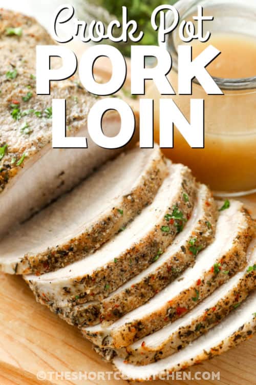 sliced Crock Pot Pork Loin with a glass of gravy and writing