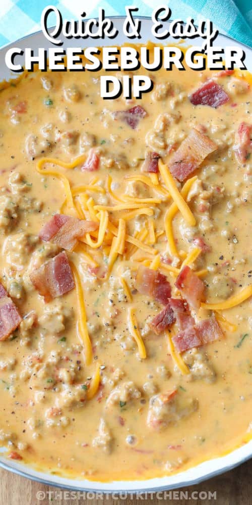 cooked Bacon Cheeseburger Dip in a bowl with writing