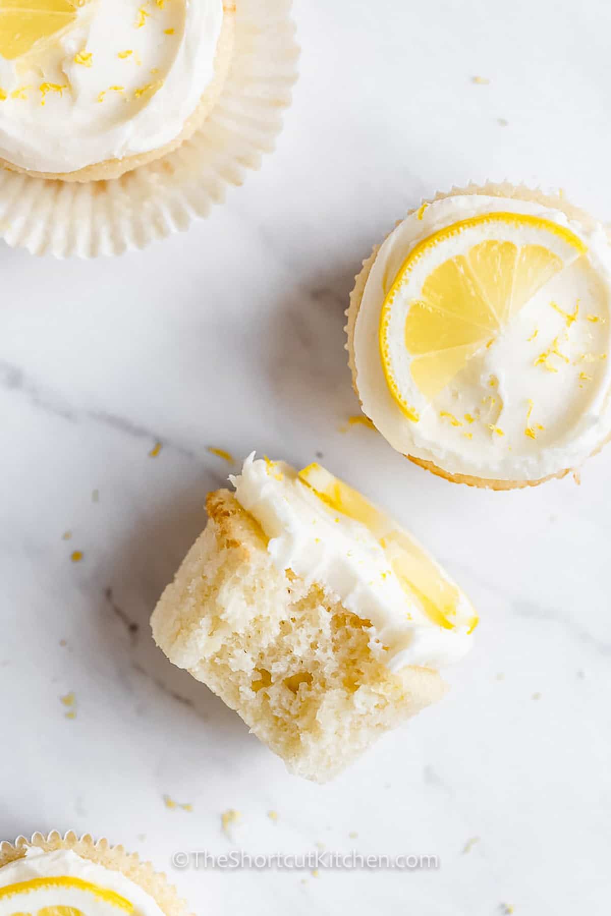 Lemon Cupcakes with a bite taken out of one