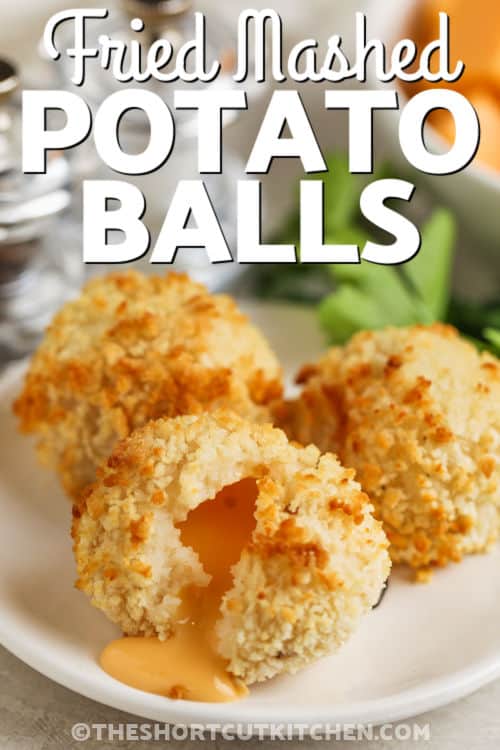 Fried Mashed Potato Balls with one open and writing