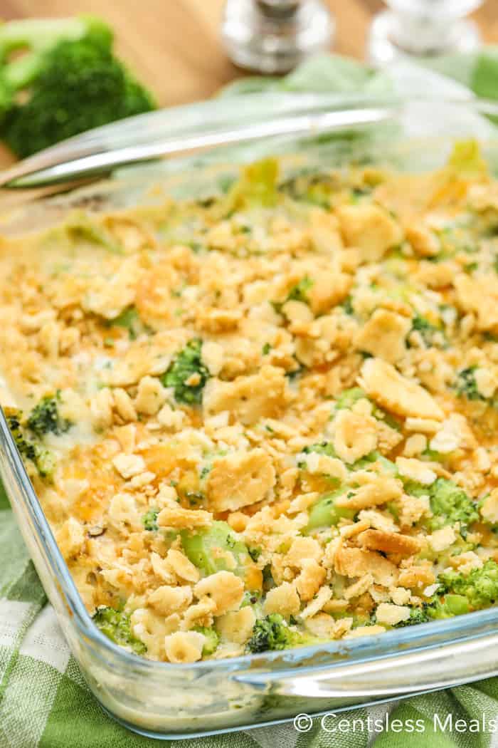 broccoli casserole in a square, clear baking dish