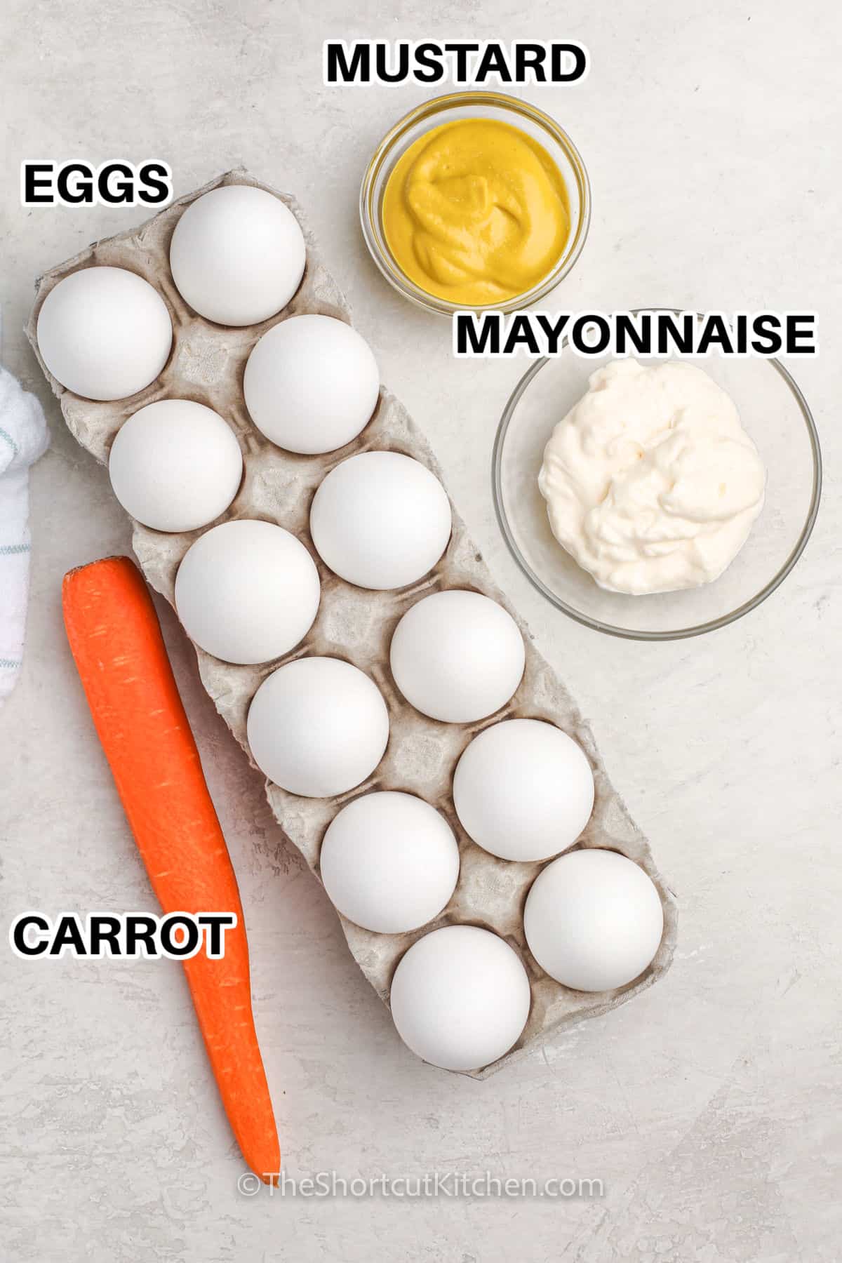 carrot , eggs , mustard and mayonnaise with labels to make Deviled Egg Chicks