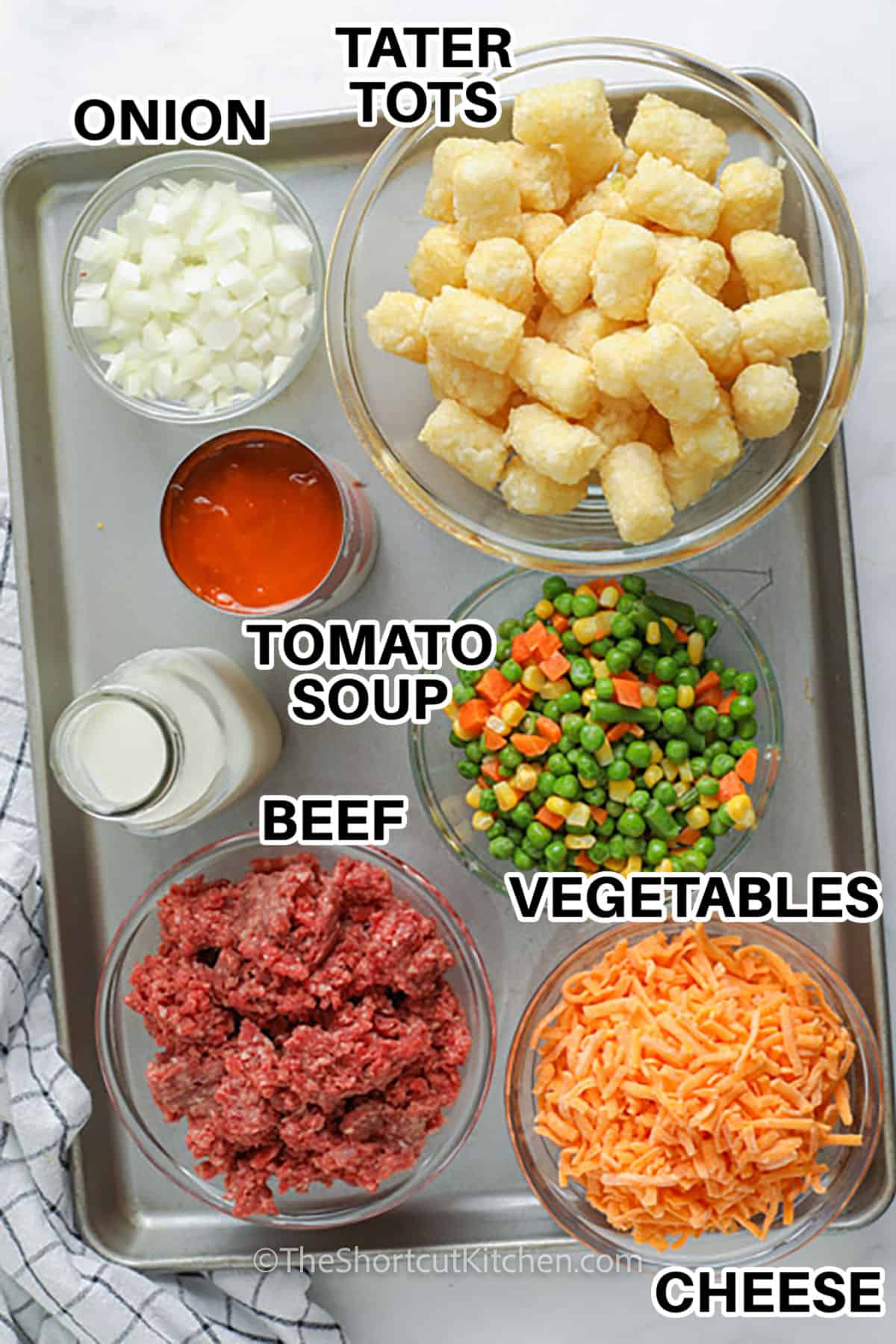 tater tots , onions , tomato soup , beef , vegetables and cheese with labels to make Shortcut Shepherd’s Pie