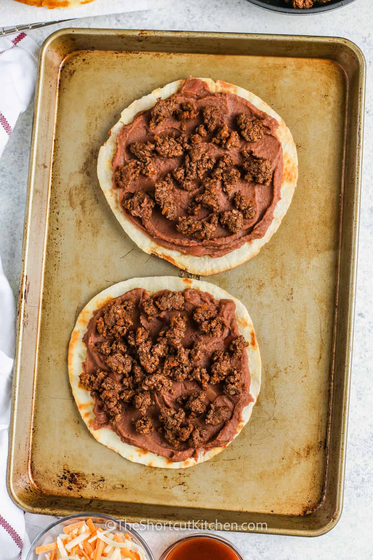 adding beef to tortilla to make Copycat Taco Bell Mexican Pizza