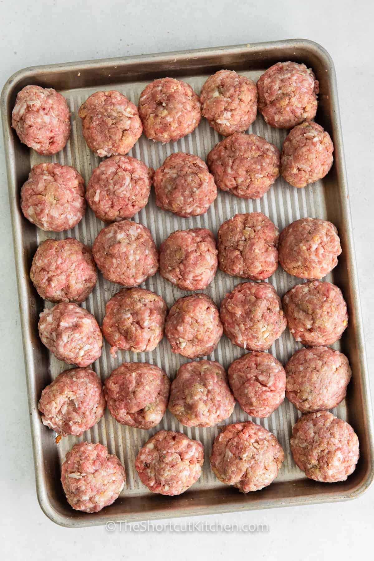 shaping Easy Air Fryer Meatballs into balls
