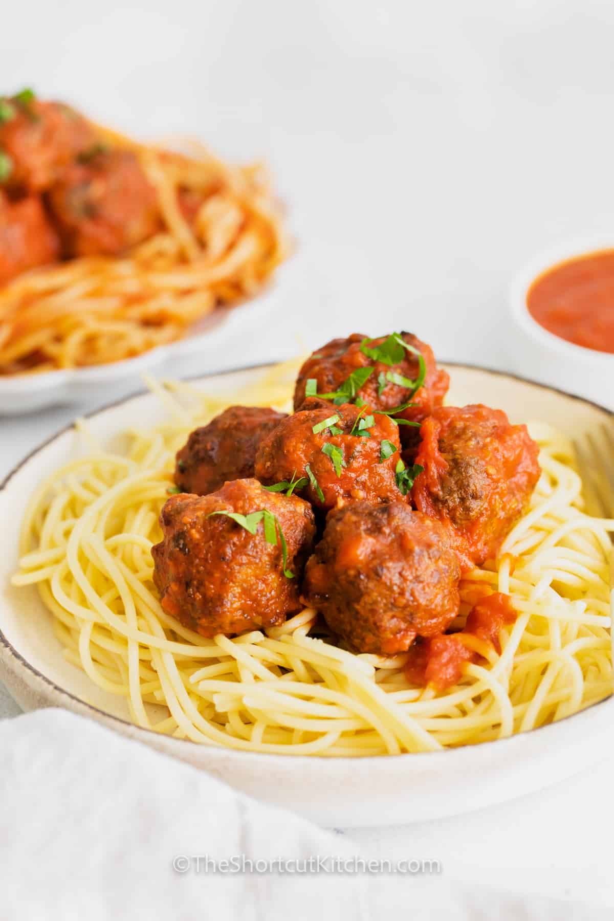 close up of Easy Air Fryer Meatballs with spaghetti