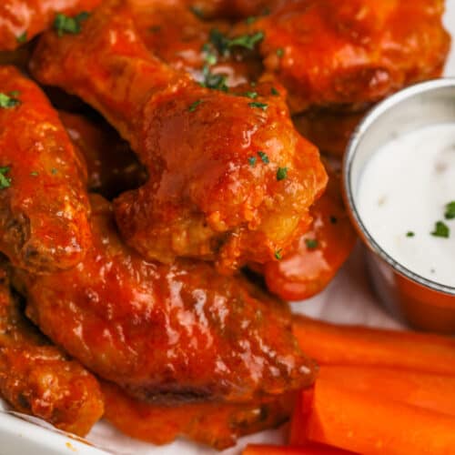 Oven Baked Chicken Wings with ranch dip and carrots