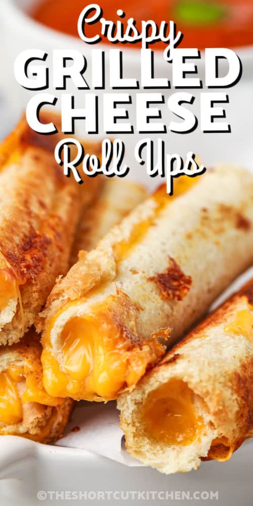 close up of Grilled Cheese Roll Ups with writing