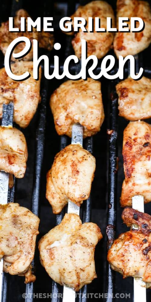 Lime Grilled Chicken Kabobs on the grill cooking with writing