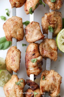 Skewered lime grilled chicken kabobs with lime and cilantro.