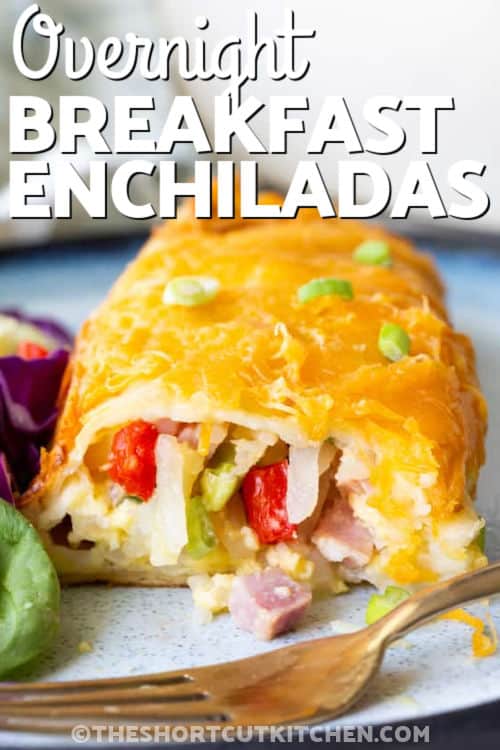breakfast enchiladas recipe on a plate with writing