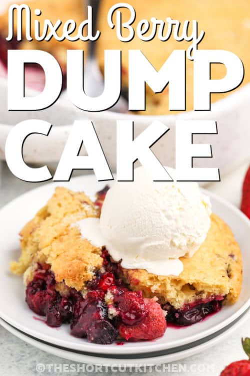 piece of Mixed Berry Dump Cake on a plate with ice cream and a title