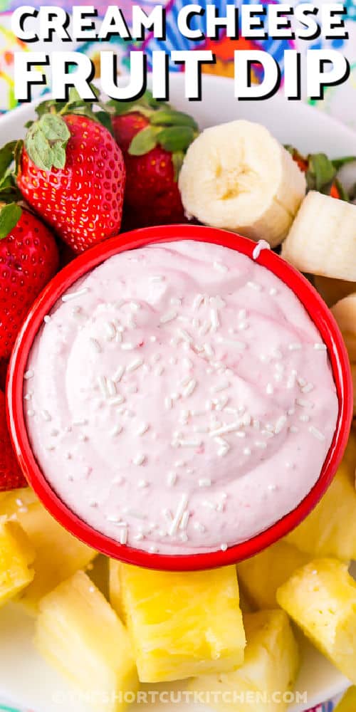 Strawberry Cream Cheese Fruit Dip with fruit around it and a title
