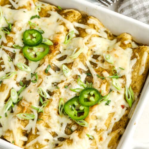 easy chicken enchiladas in a dish