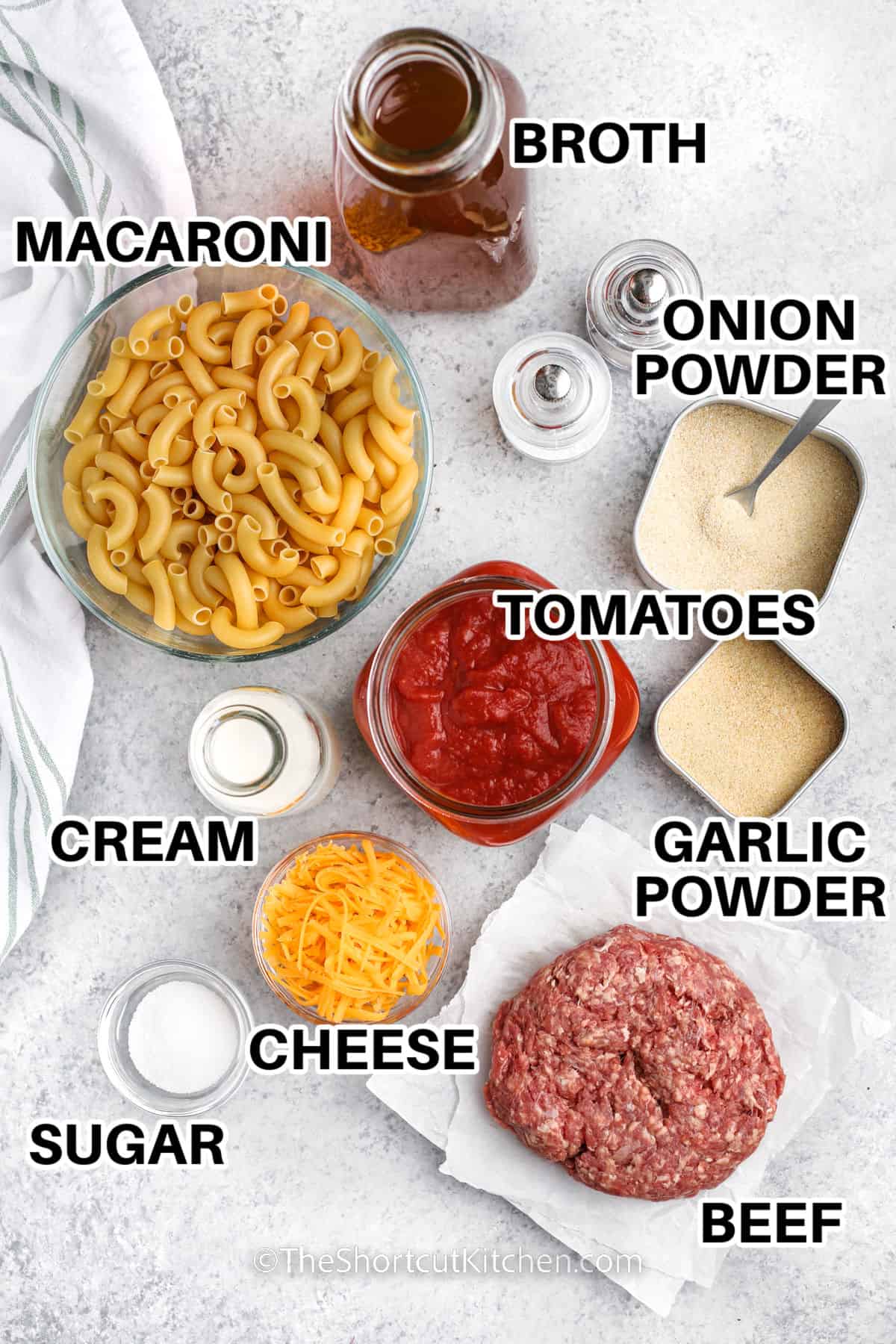 broth , macaroni , onion powder , garlic powder , tomatoes , cream , cheese , sugar and beef with labels to make Homemade Beefaroni Recipe