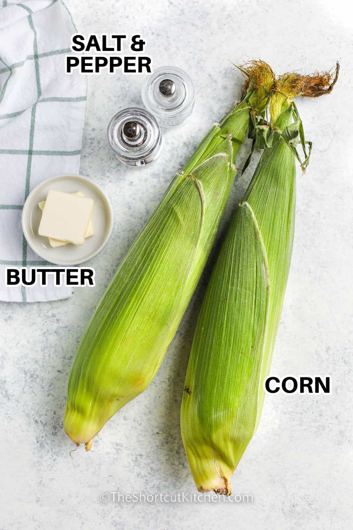 corn , salt and pepper , and butter with labels to make Microwave Corn On The Cob