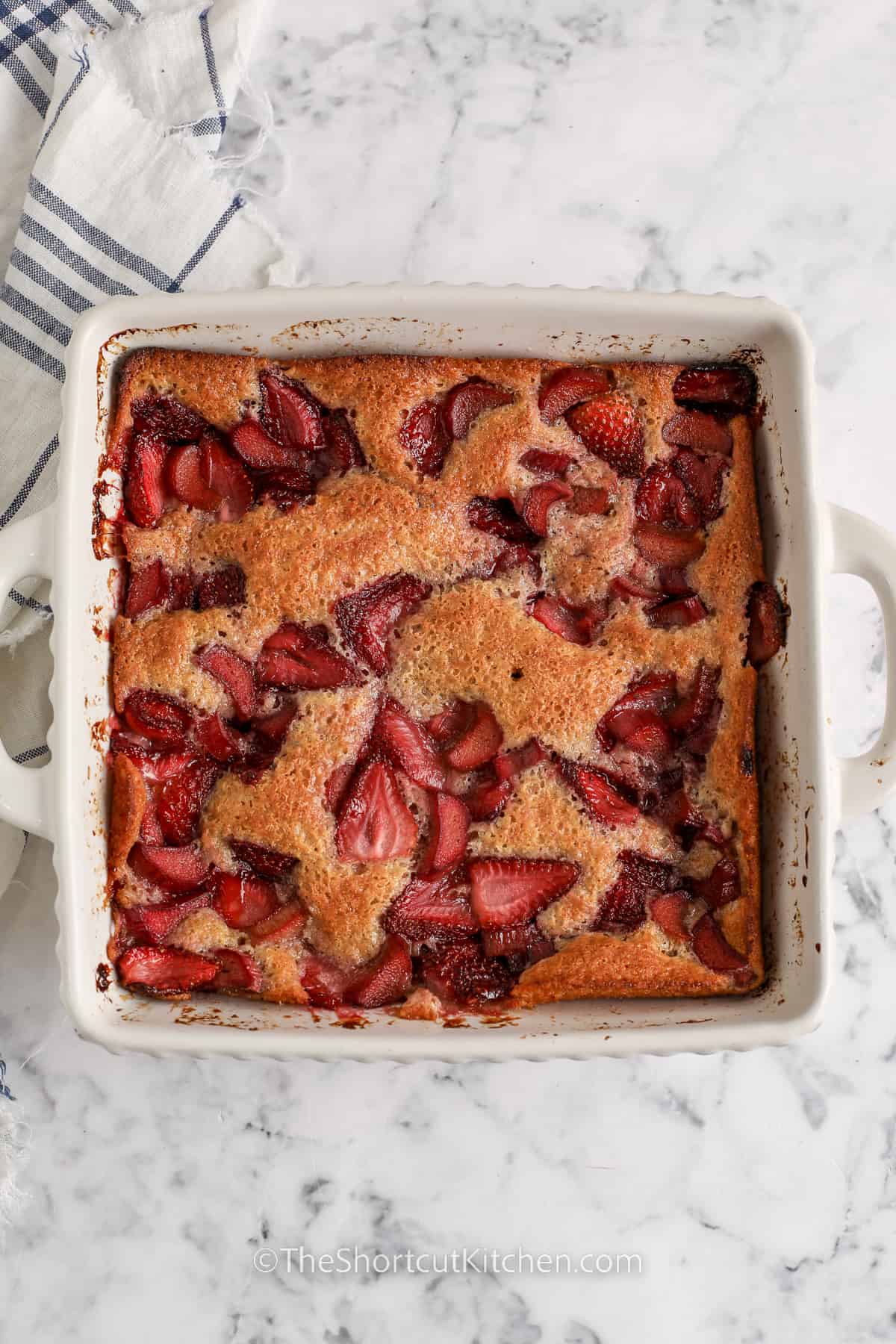 baked Strawberry Rhubarb Cobbler in the dish