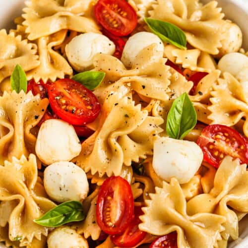 close up of Caprese Pasta Salad in a bowl