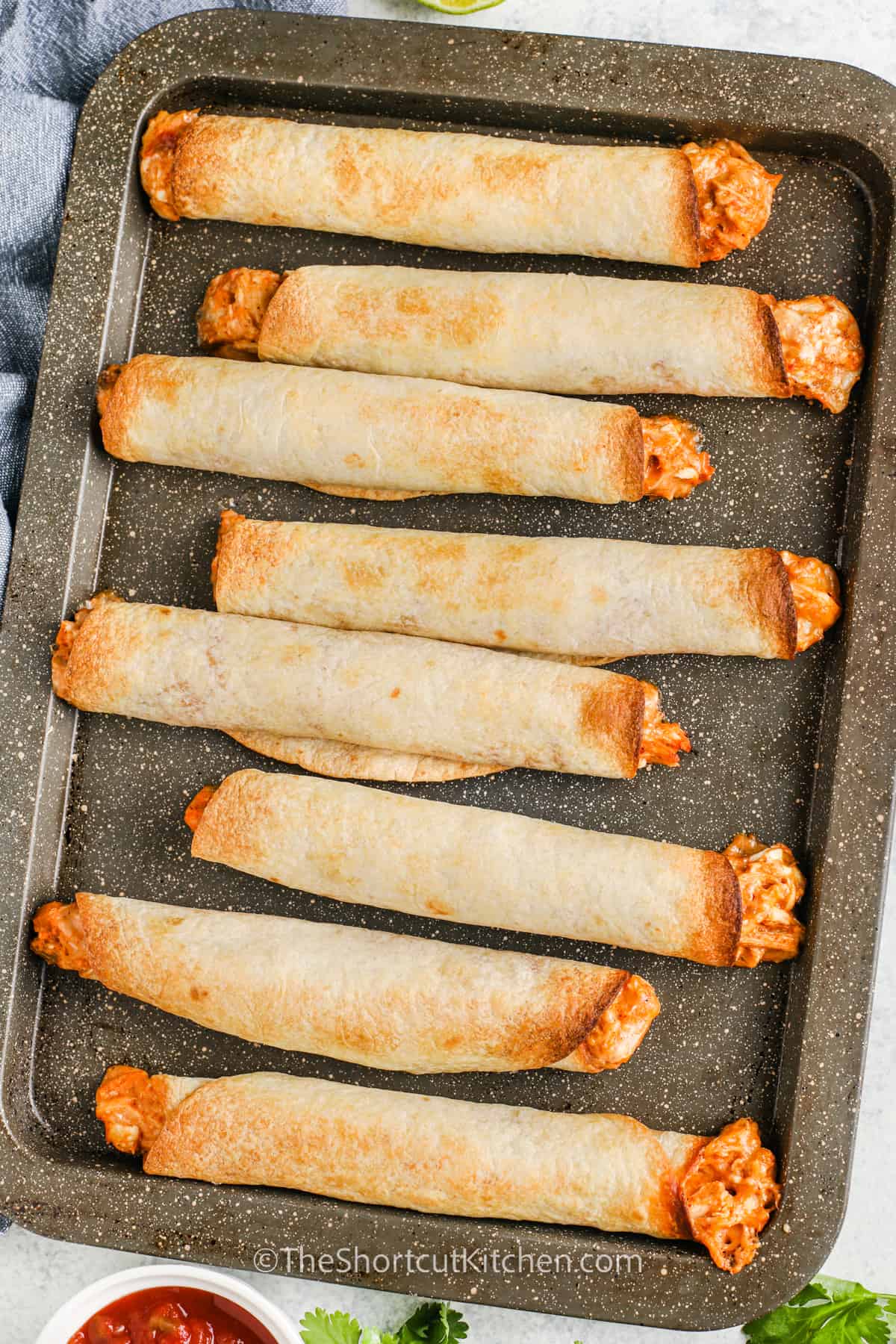 baked Chicken Taquitos on a sheet pan